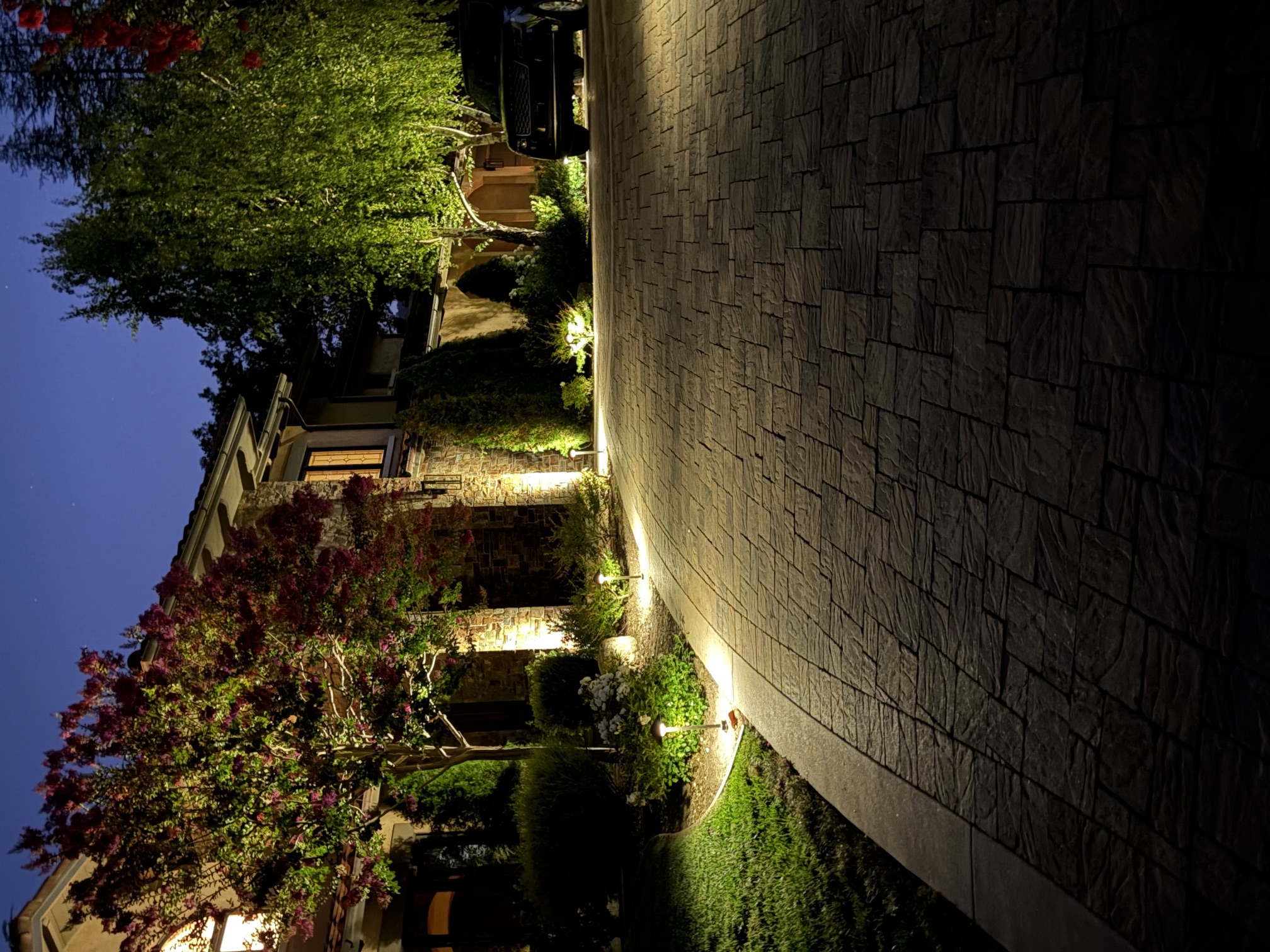 Twin Palms Lighting pathway and bollard lighting along a stone driveway